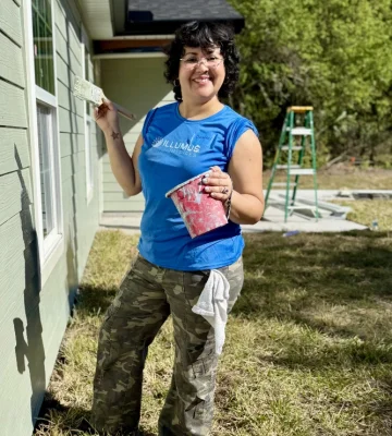 Domibel Painting Outside